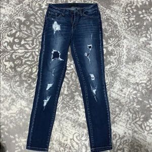 Distressed skinny KanCans.